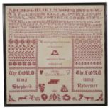 A Victorian needlework sampler by Julia A Moore, dated 1883
