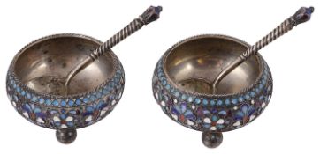 A pair of Russian silver and cloisonne salts with spoons