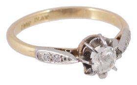 An 18ct gold and platinum mounted single stone diamond set ring