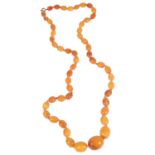 A 'butterscotch' amber bead necklace