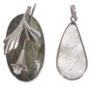 Two large modernist labadorite silver mounted pendants