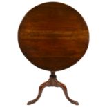 A mahogany tripod table, 19th century and later