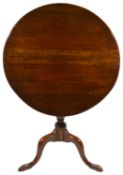 A mahogany tripod table, 19th century and later