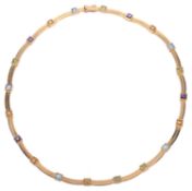 An attractive Continental multi gem set 18ct gold choker necklace