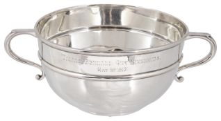 A George V silver twin handled christening bowl, hallmarked Sheffield 1914