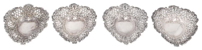 A set of four Victorian pierced heart shaped trinket dishes, hallmarked Chester 1896