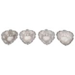 A set of four Victorian pierced heart shaped trinket dishes, hallmarked Chester 1896