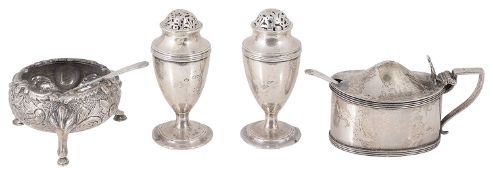 An Edwardian three piece silver cruet suite, hallmarked London 1909