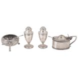 An Edwardian three piece silver cruet suite, hallmarked London 1909