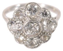 An attractive Edwardian large diamond 'daisy' cluster ring