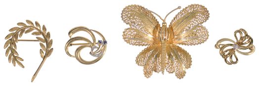 Three small contemporary gold brooches and a large butterfly pin