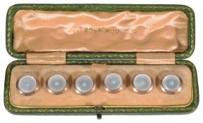 A set of Edwardian cased gold mounted mother of pearl studs