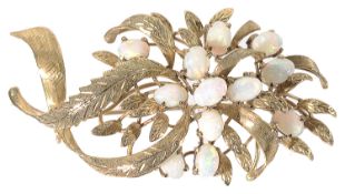 A large Continental 18k gold and opal floral spray brooch