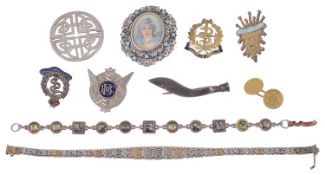 A small collection of jewellery including gold and silver enamelled 'Medical Corps' badges