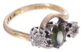 A Modern 9ct gold three stone diamond and peridot ring