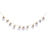 A delicate lilac stone drop necklace