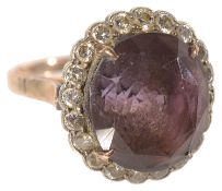 A large amethyst and diamond fancy cluster ring