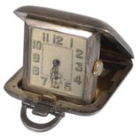 A George V silver cased Sapho miniature travelling clock, hallmarked Birmingham 1932