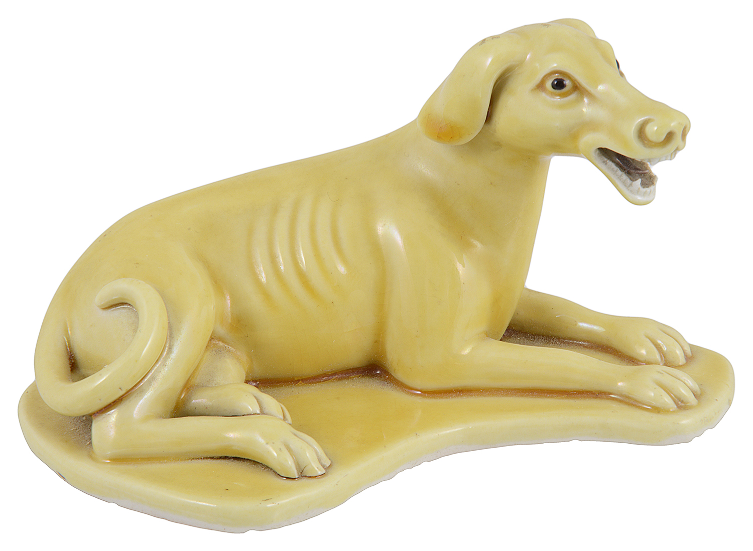 A Chinese export ware yellow glazed figure of a hound