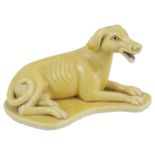 A Chinese export ware yellow glazed figure of a hound