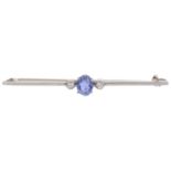 An early 20th century white coloured metal sapphire and diamond bar brooch
