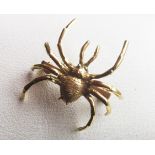 A Continental 18ct gold spider brooch