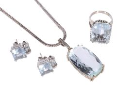 A large aquamarine set ring, aquamarine and diamond set earrings and an aquamarine pendant