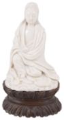 An early 19th century Chinese blanc de chine porcelain figure of Guanyin