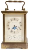 A Matthew Norman brass-cased four-dial carriage clock with 'rolling moon phase'
