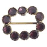 A Georgian oval almandine garnet brooch