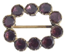 A Georgian oval almandine garnet brooch