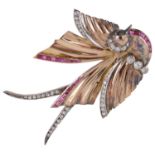 A Continental Art Deco ruby and diamond set bird cocktail brooch and ear clips