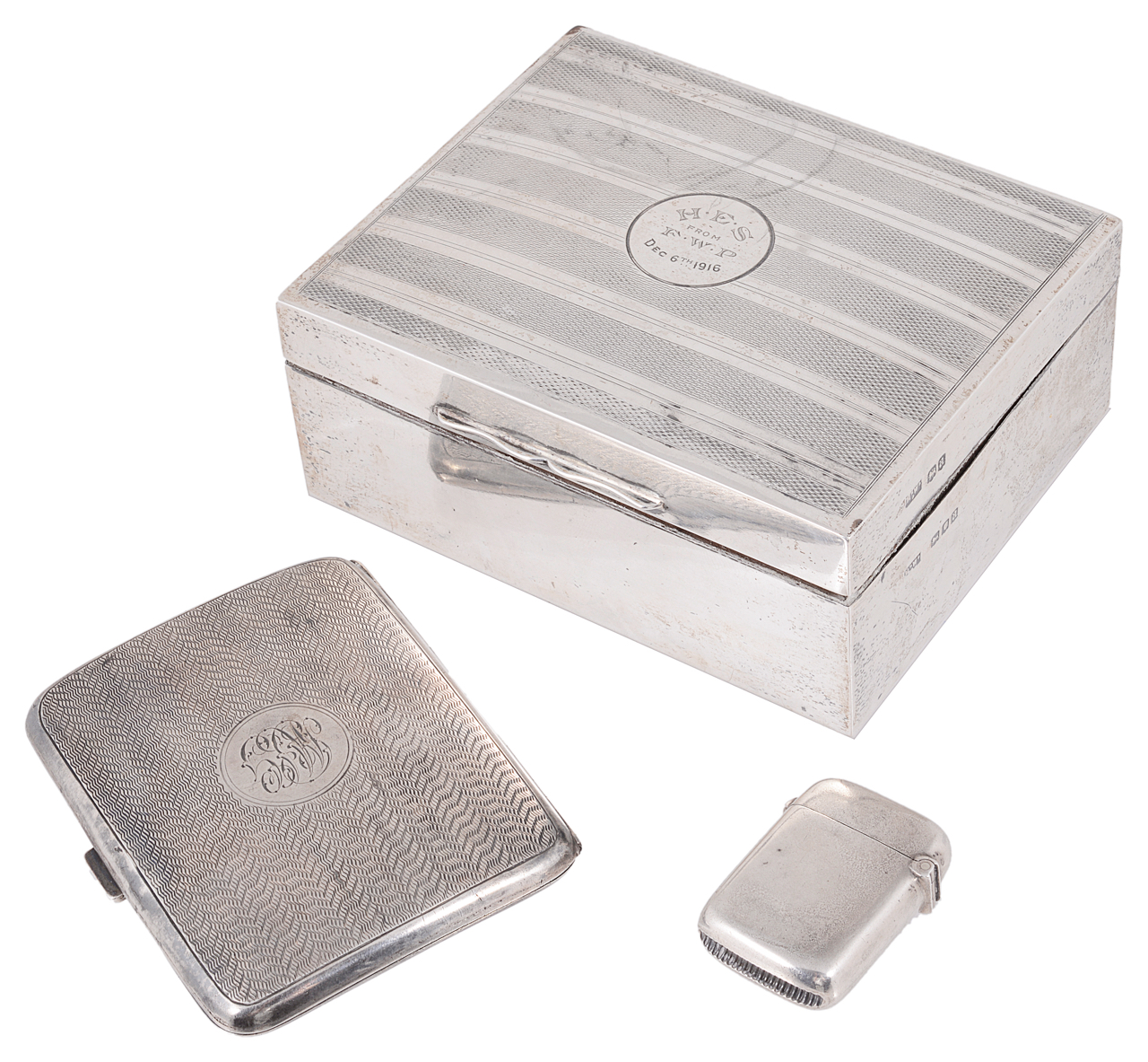 A silver cigarette box, cigarette case and vesta