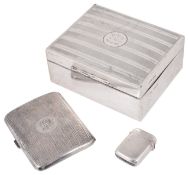 A silver cigarette box, cigarette case and vesta