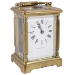 A Mappin & Webb four glass brass carriage clock