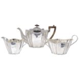 A Victorian and George V three piece silver tea service