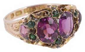 A charming early 19th century 15ct gold green gem and alamadine garnet dress ring