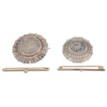 A 14ct gold and platinum set single stone diamond bar brooch