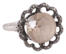 An attractive white metal dress ring set with champagne coloured zircon