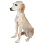 An Italian pottery seated whippet,