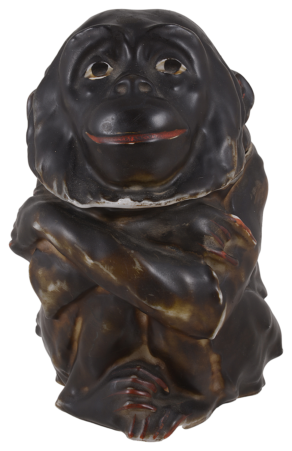 A 20th century hard paste porcelain tobacco jar in the form of a monkey