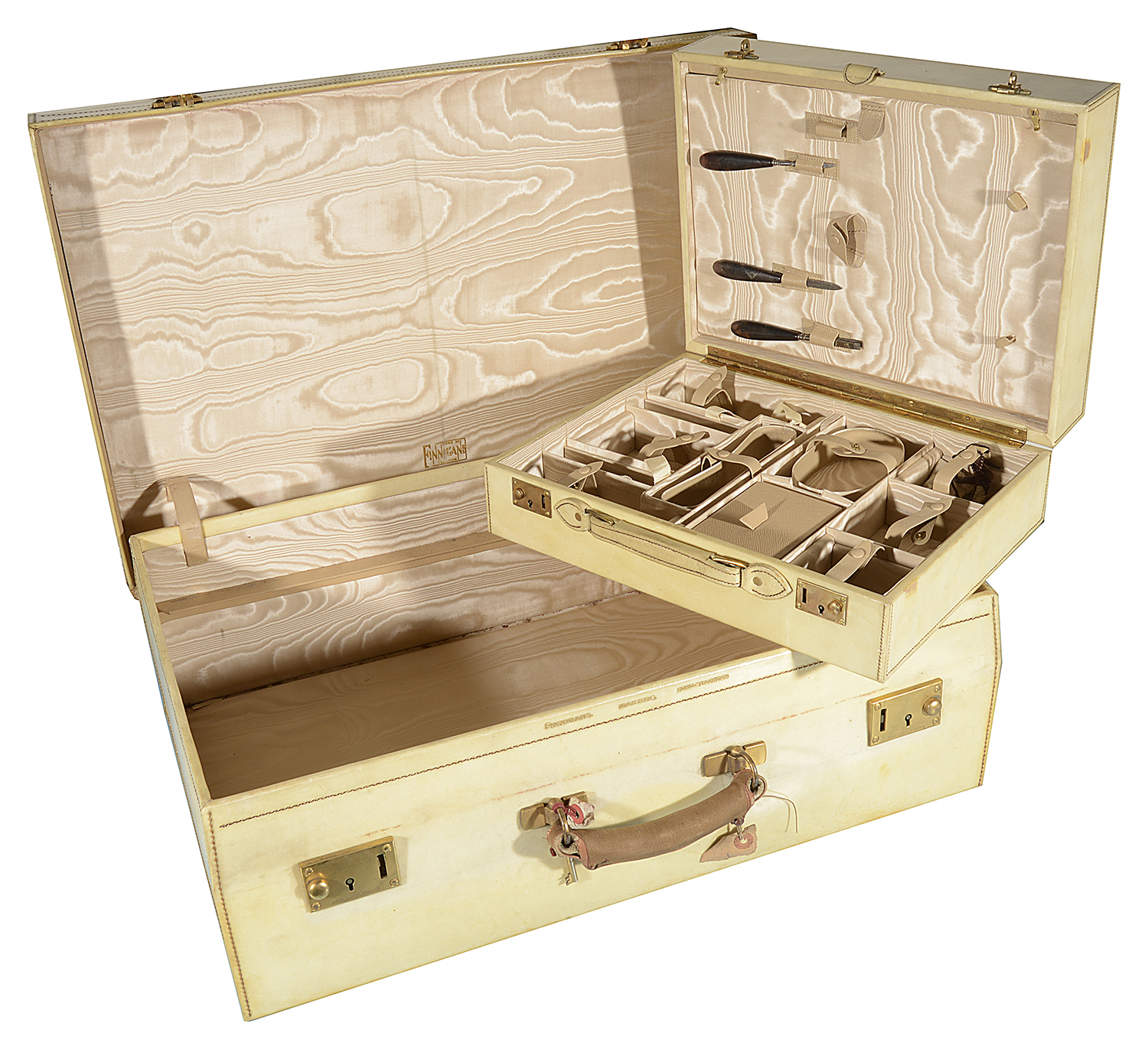 A Finnigans of Bond Street London vellum travelling suitcase and vanity case, early 20th century