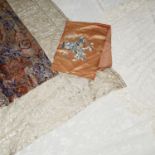 A 1930's silk and gold thread textile and other textiles