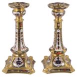 A pair of Royal Crown Derby 'Imari' pattern candlesticks, early 20th century