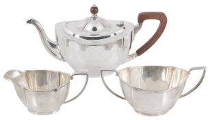A George V silver three piece tea service, hallmarked Birmingham 1933/1934