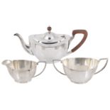 A George V silver three piece tea service, hallmarked Birmingham 1933/1934