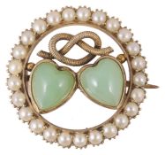 A delicate Edwardian chrysophrase set twin heart brooch