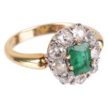 An attractive Vict. style emerald and diamond set cluster ring