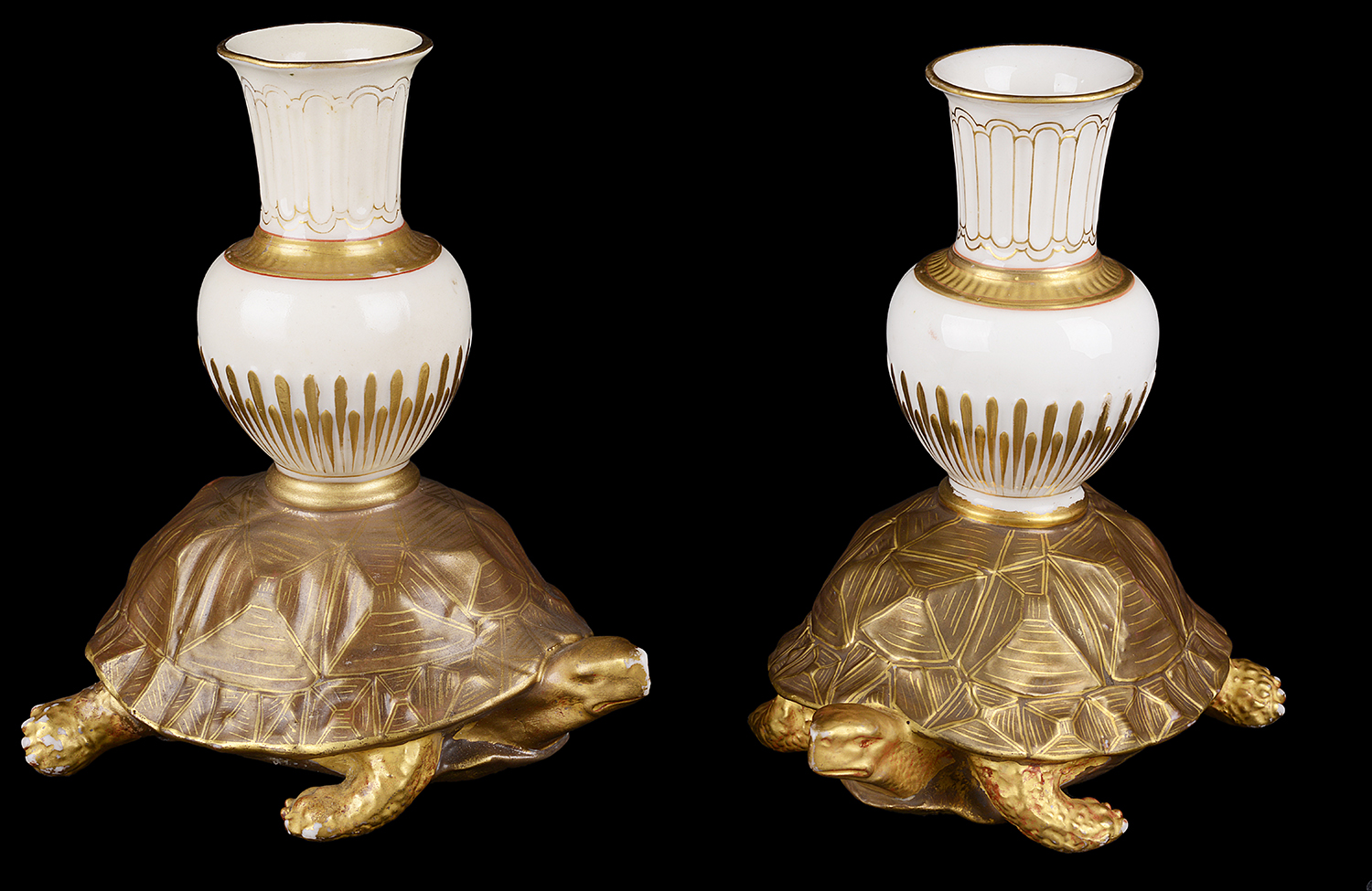 A pair of Royal Worcester aesthetic period tortoise candlesticks(2)