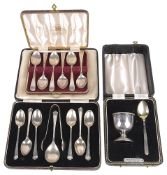 George V and later silver teaspoons and christening suite(3 cases)
